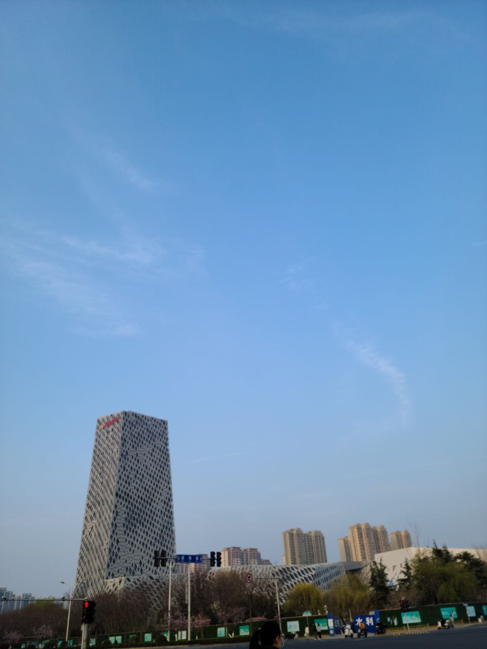 a city skyline with a blue sky